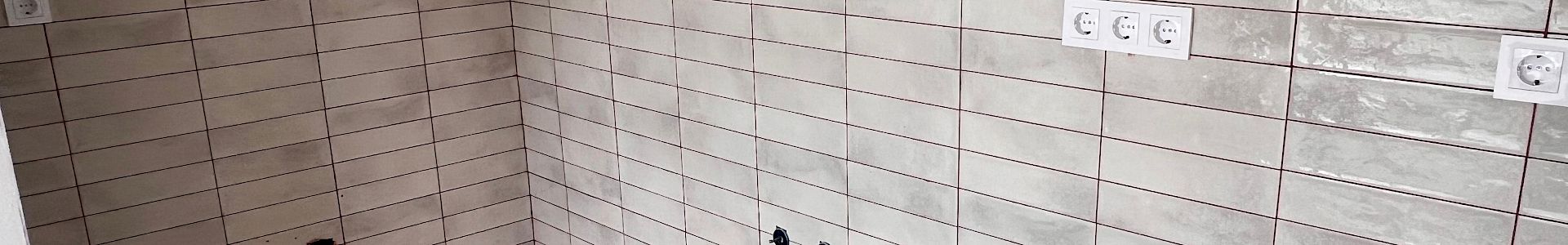 Professionally done tiled surfaces in a kitchen area.